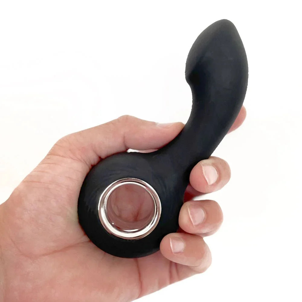 VERS P-Spot Vibe held in a hand, finger through the silver-lined ring handle