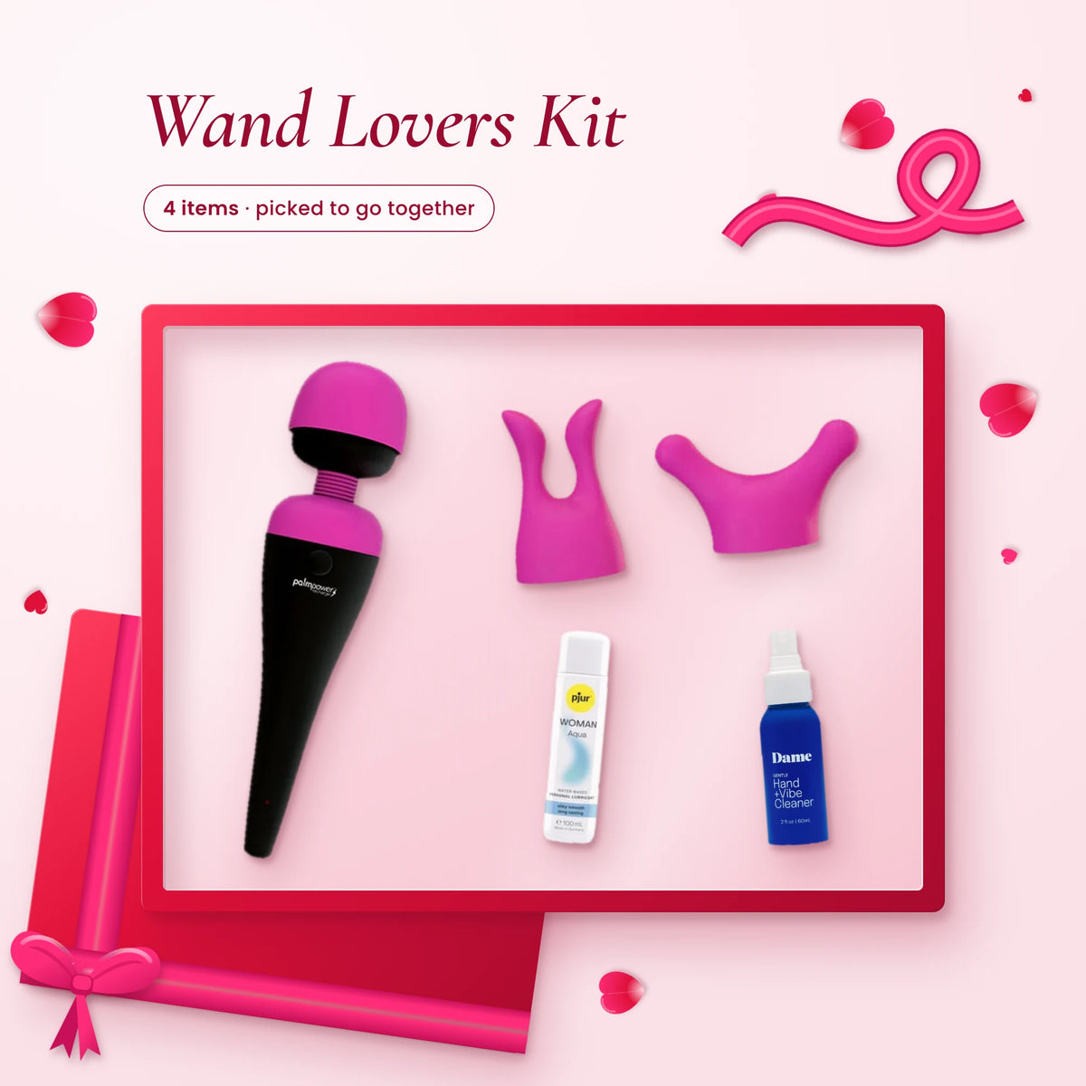Wand Lovers Kit: a pink and black PalmPower wand, two pink attachments, pjur lube and Dame cleaner on a pink backdrop