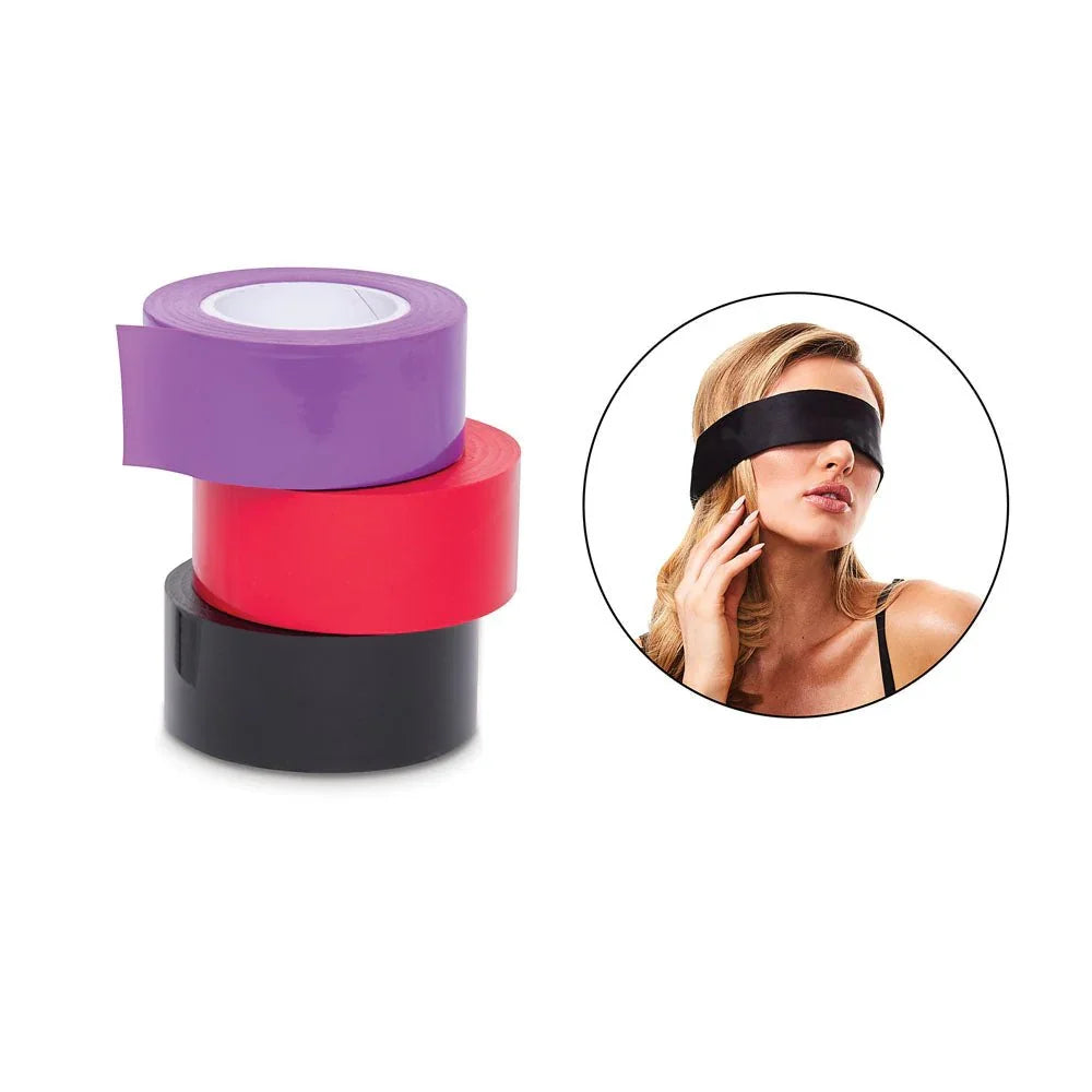 Three rolls of bondage tape stacked in purple, red and black beside a model in the blindfold