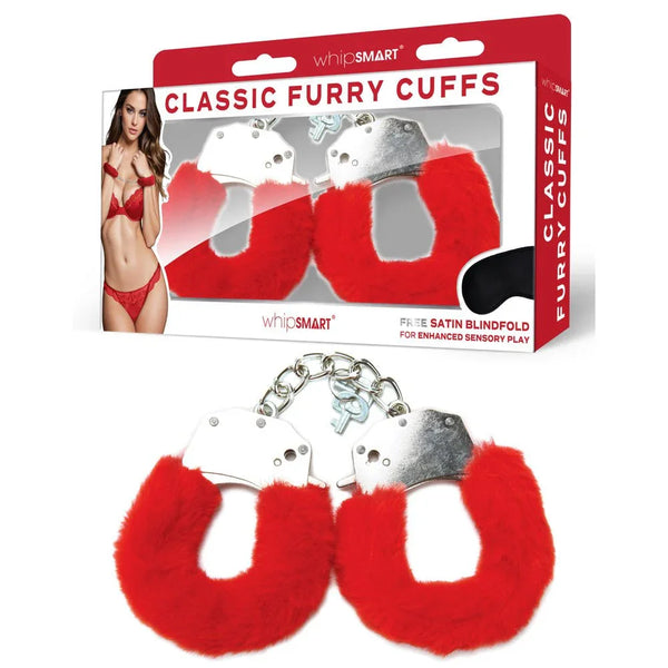 WhipSmart Classic Furry Cuffs in Red laid in front of their retail box
