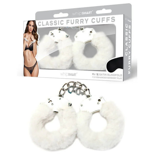 WhipSmart Classic Furry Cuffs in White laid in front of their retail box