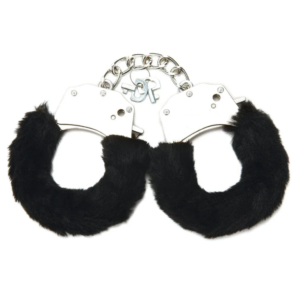 Black furry handcuffs alone on white, chrome cuffs with two keys on the chain