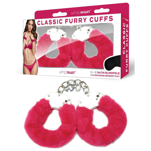 WhipSmart Classic Furry Cuffs in Hot Pink laid in front of their retail box