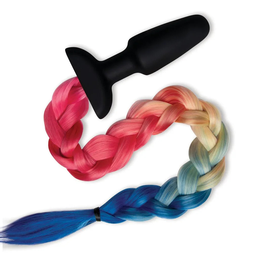 Close-up of the rainbow braid coiled beside the flared black silicone plug