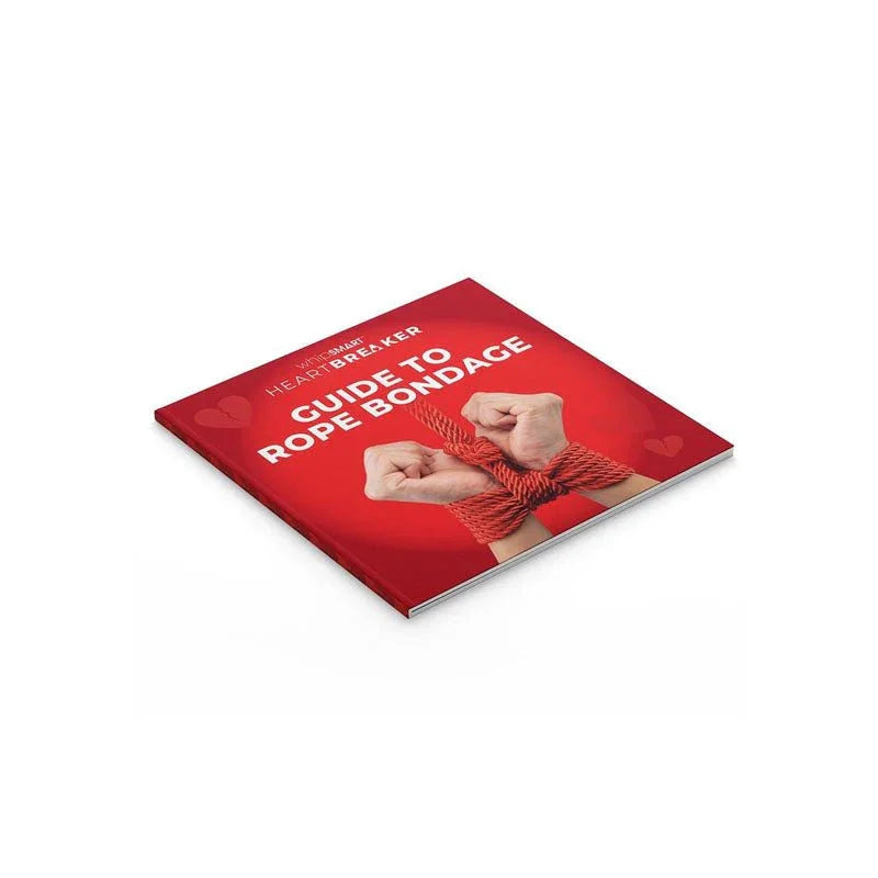The included Heartbreaker Guide To Rope Bondage booklet, red cover with bound wrists