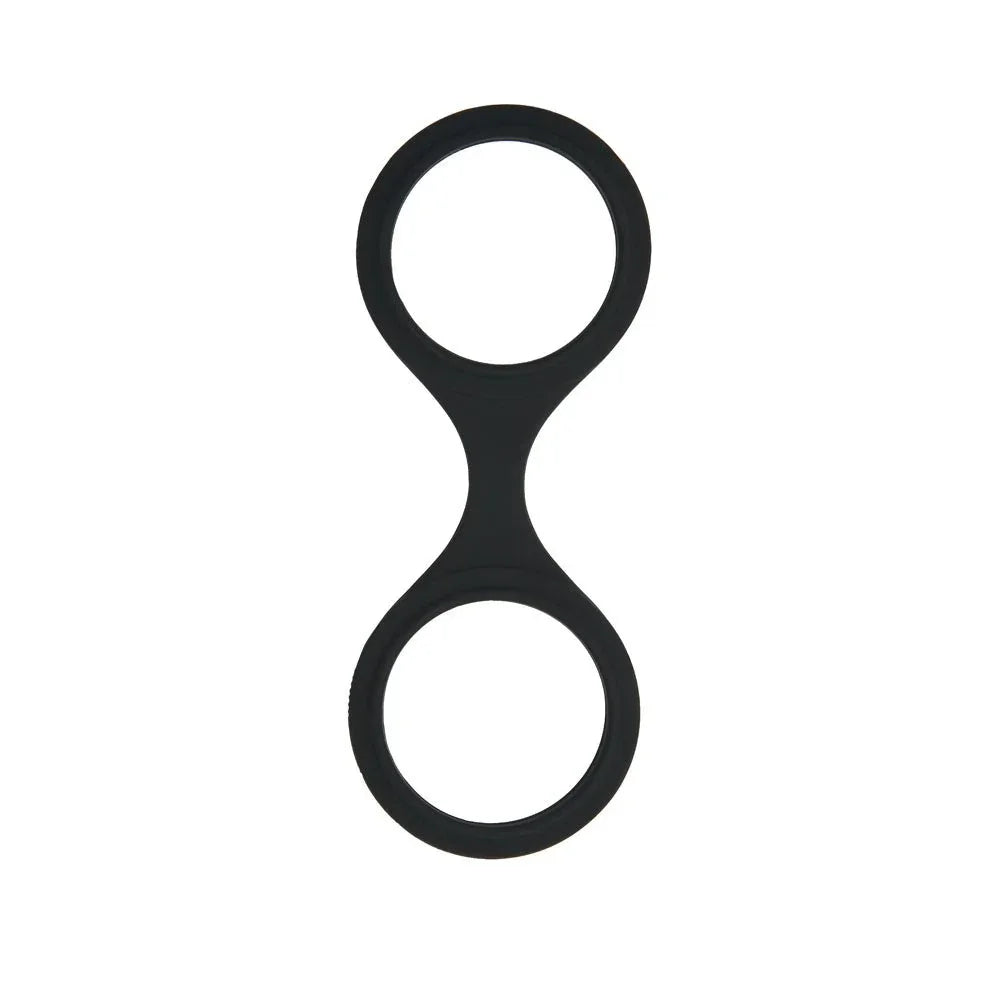 Black silicone wrist and ankle cuff alone on white, two wide loops joined by a bridge