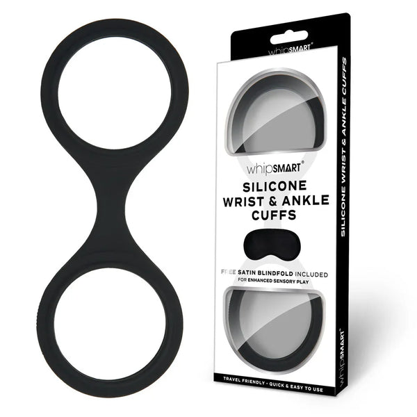 WhipSmart Silicone Wrist and Ankle Cuffs in Black beside their blister pack
