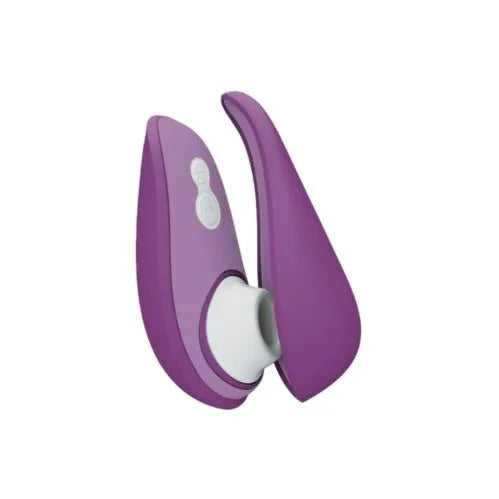 Womanizer Liberty 2 in Purple with its magnetic travel cover set beside it