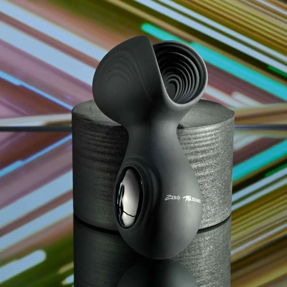 Handy Helper upright with the control button on the black silicone body