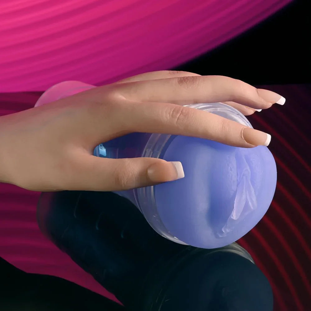 Pop On The Glow stroker held in a hand, opening toward the camera