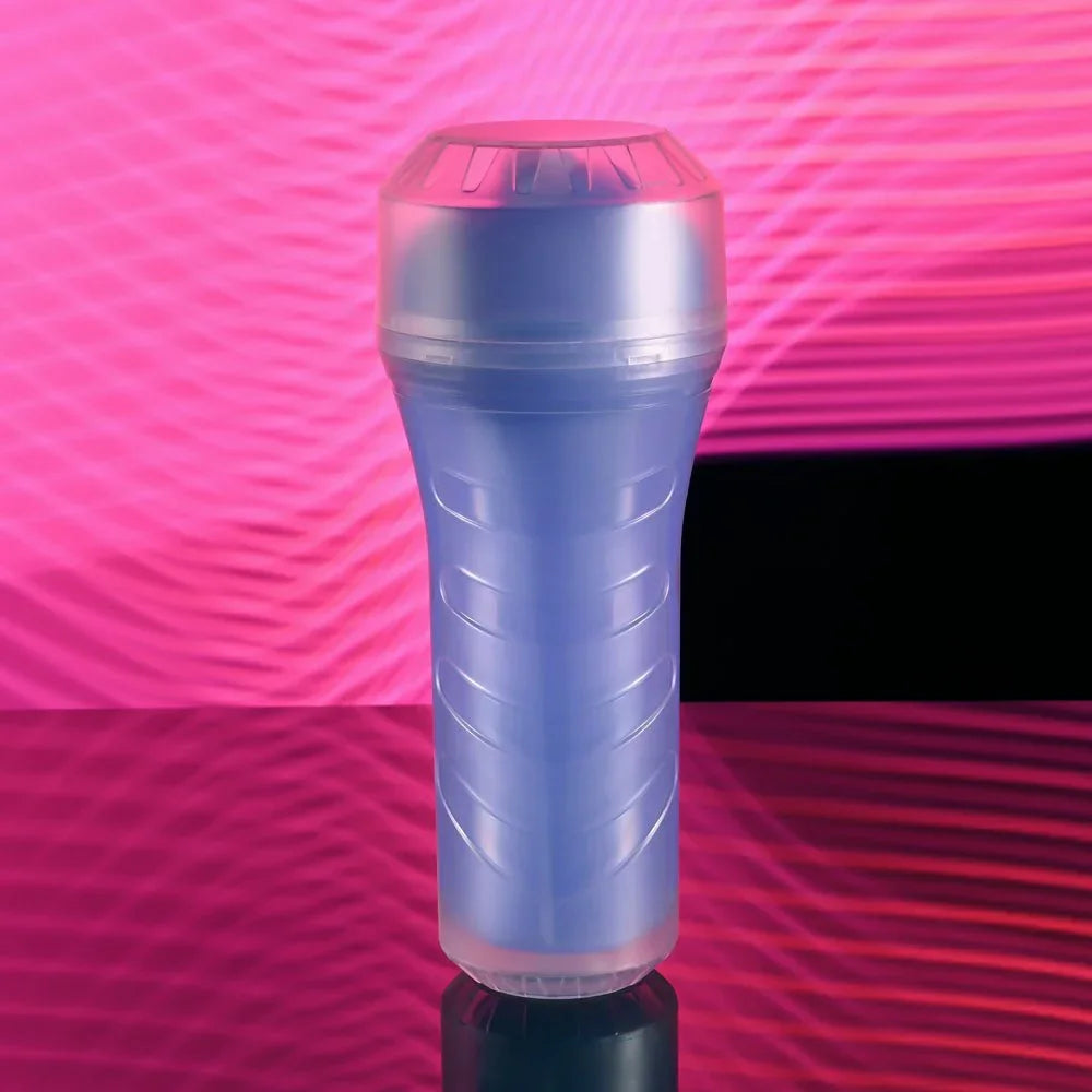 Pop On The Glow stroker standing upright with the clear cap fitted