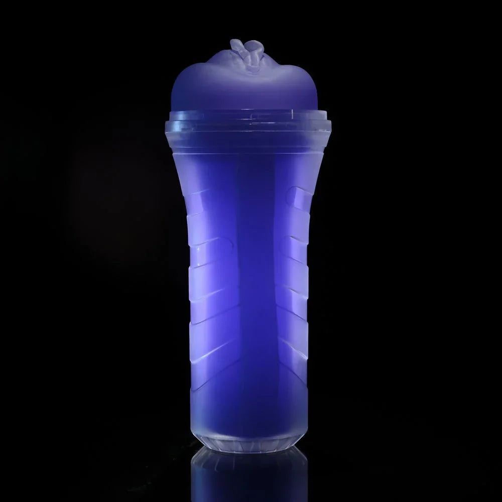 Pop On The Glow stroker glowing purple in a darkened room