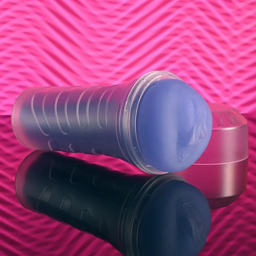 Pop On The Glow strokers lying on a pink backdrop with the end cap