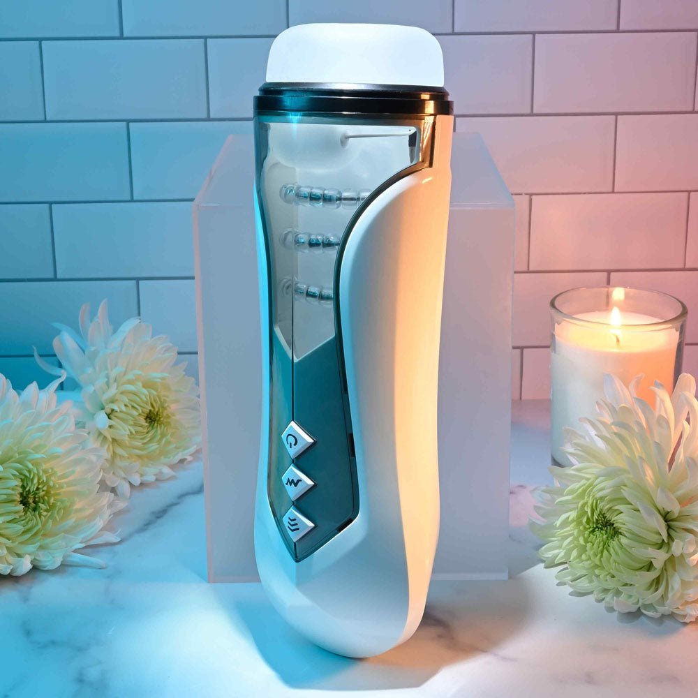 Zero Tolerance STROKING BUDDY - White USB Rechargeable Vibrating & Thrusting Stroker – Sex toys NZ by Naughtyhut. Discreet delivery nationwide.