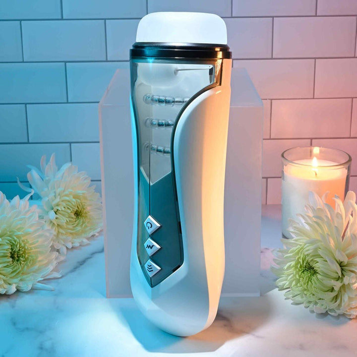 Zero Tolerance STROKING BUDDY - White USB Rechargeable Vibrating & Thrusting Stroker – Sex toys NZ by Naughtyhut. Discreet delivery nationwide.