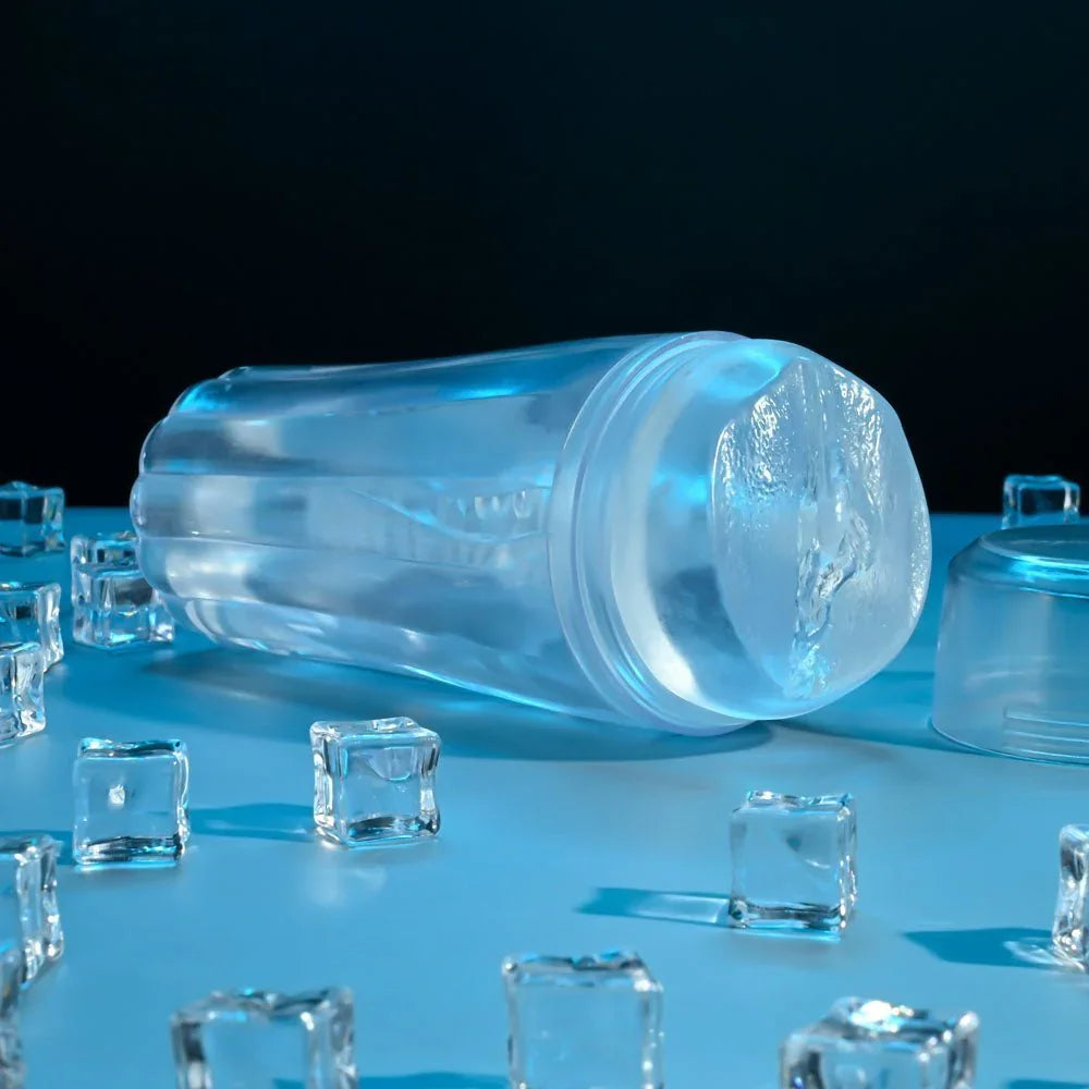 The Clear Choice stroker lying among ice cubes on a blue surface