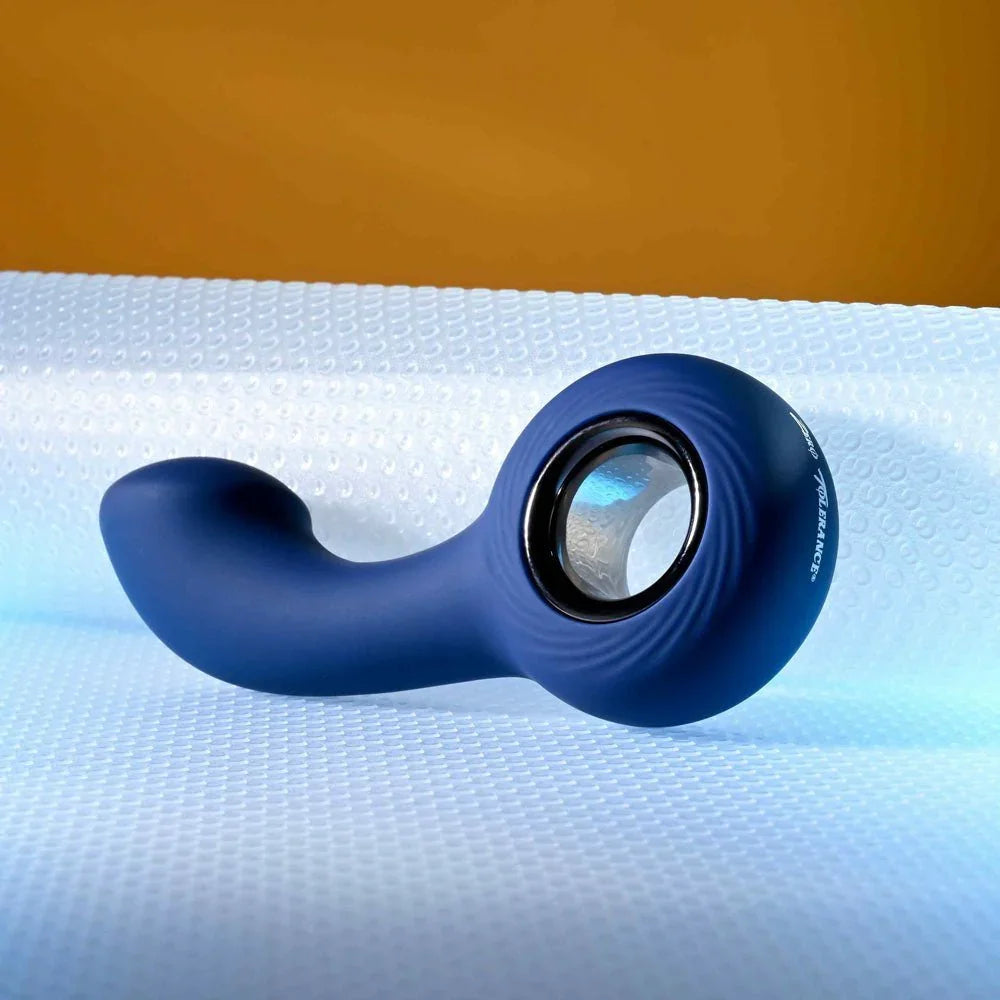 The Reach lying flat with the curved tip to the left and ring handle right