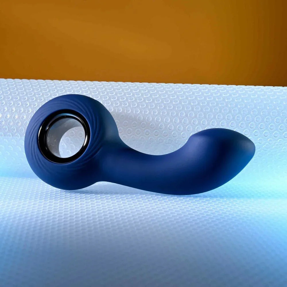 The Reach lying on its side with the metal ring handle at the left