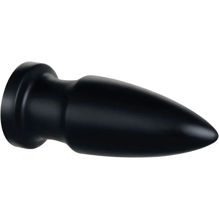 The Titan black plug on its side, showing the tapered tip and ridged shaft