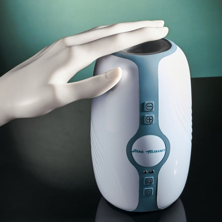 Buy Zero Tolerance TOUCHDOWN - White 15 cm USB Rechargeable Vibrating & Tightening Stroker – Naughtyhut NZ sex toys online. Discreet delivery & top brands.