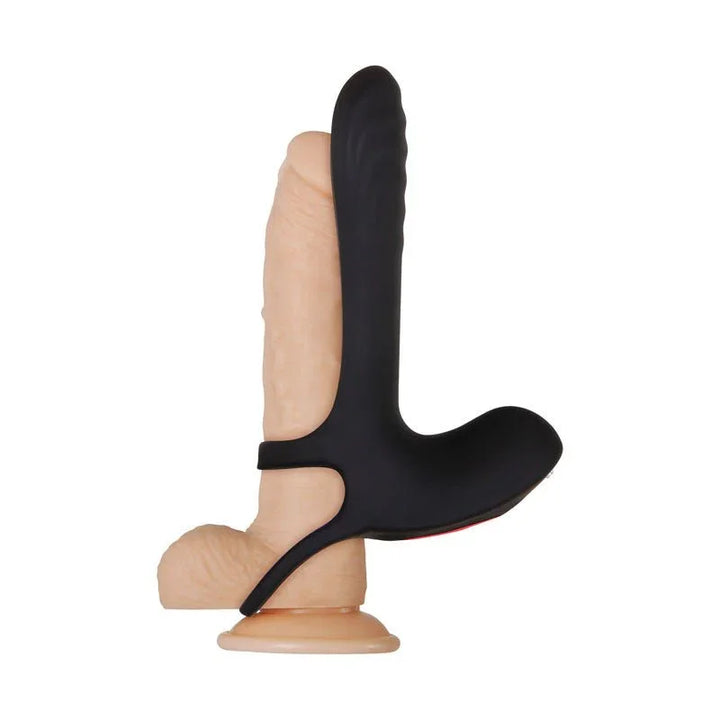 Vibrating Girth Enhancer fitted over a flesh-tone demo dildo, side view