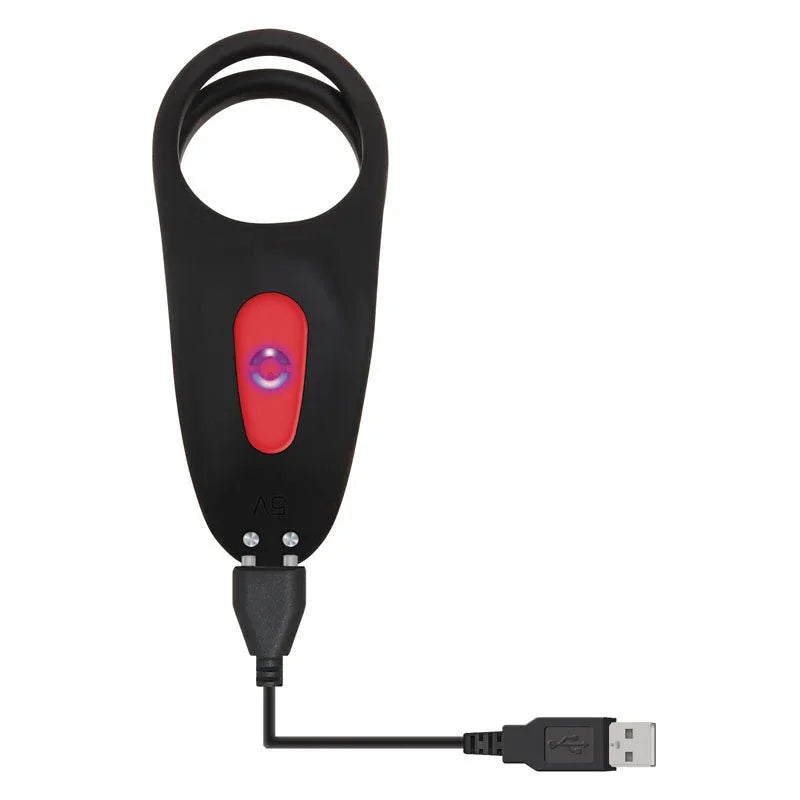 Girth Enhancer with its USB charging cable plugged into the base
