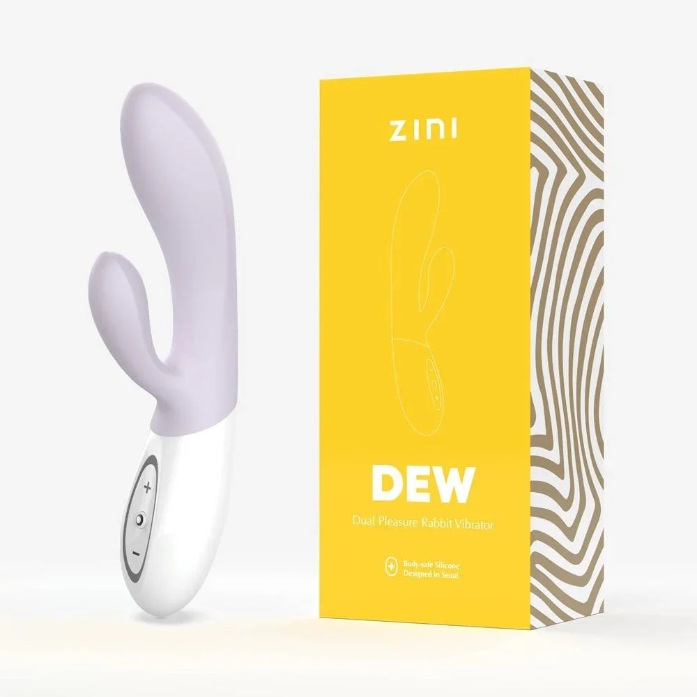 Zini Dew rabbit vibrator in pale lilac beside its yellow retail box