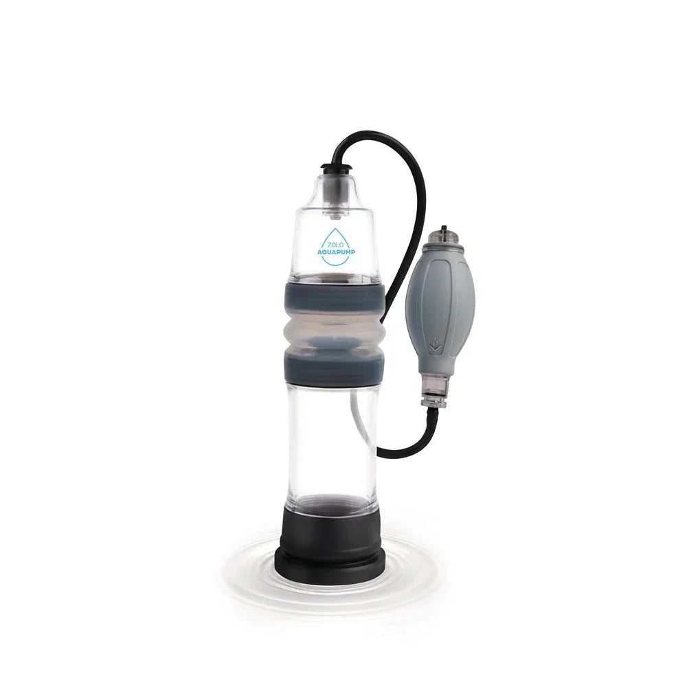 Zolo Aquapump Compact standing in shallow water with the grey hand bulb beside it